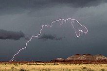 Dinosaur shaped lightning over Blue Mesa